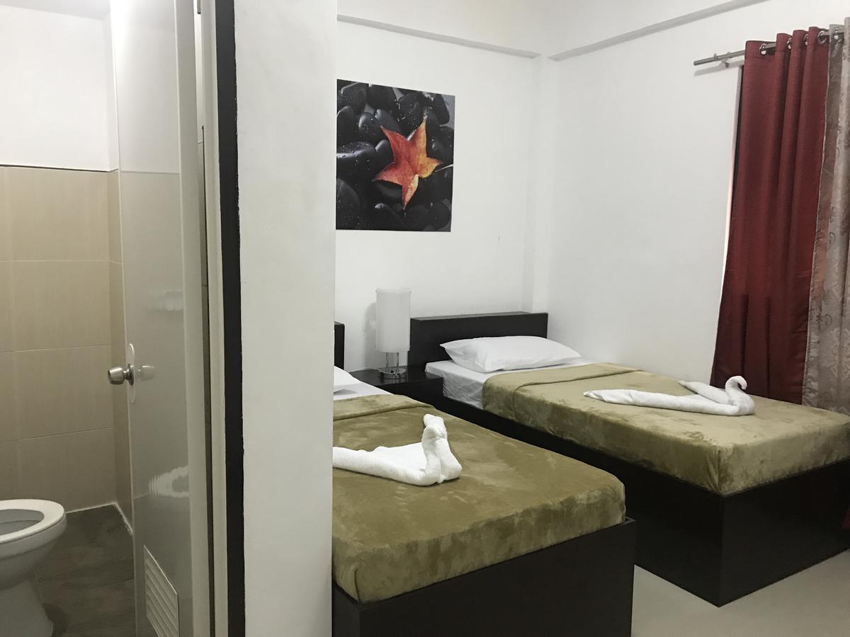 4C'S Tourist Lodge Puerto Princesa Екстериор снимка